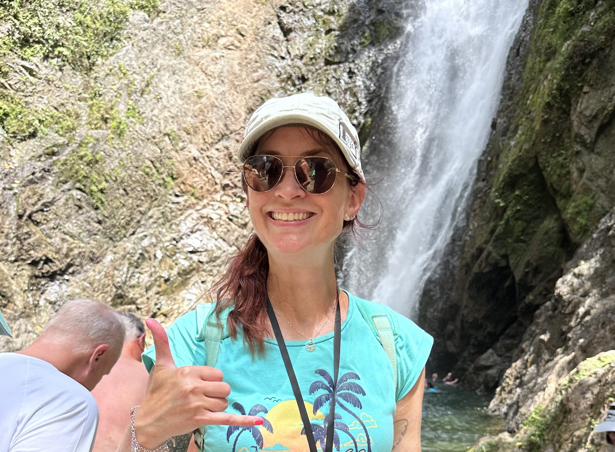 A picture of me in front of a waterfall in Fiji